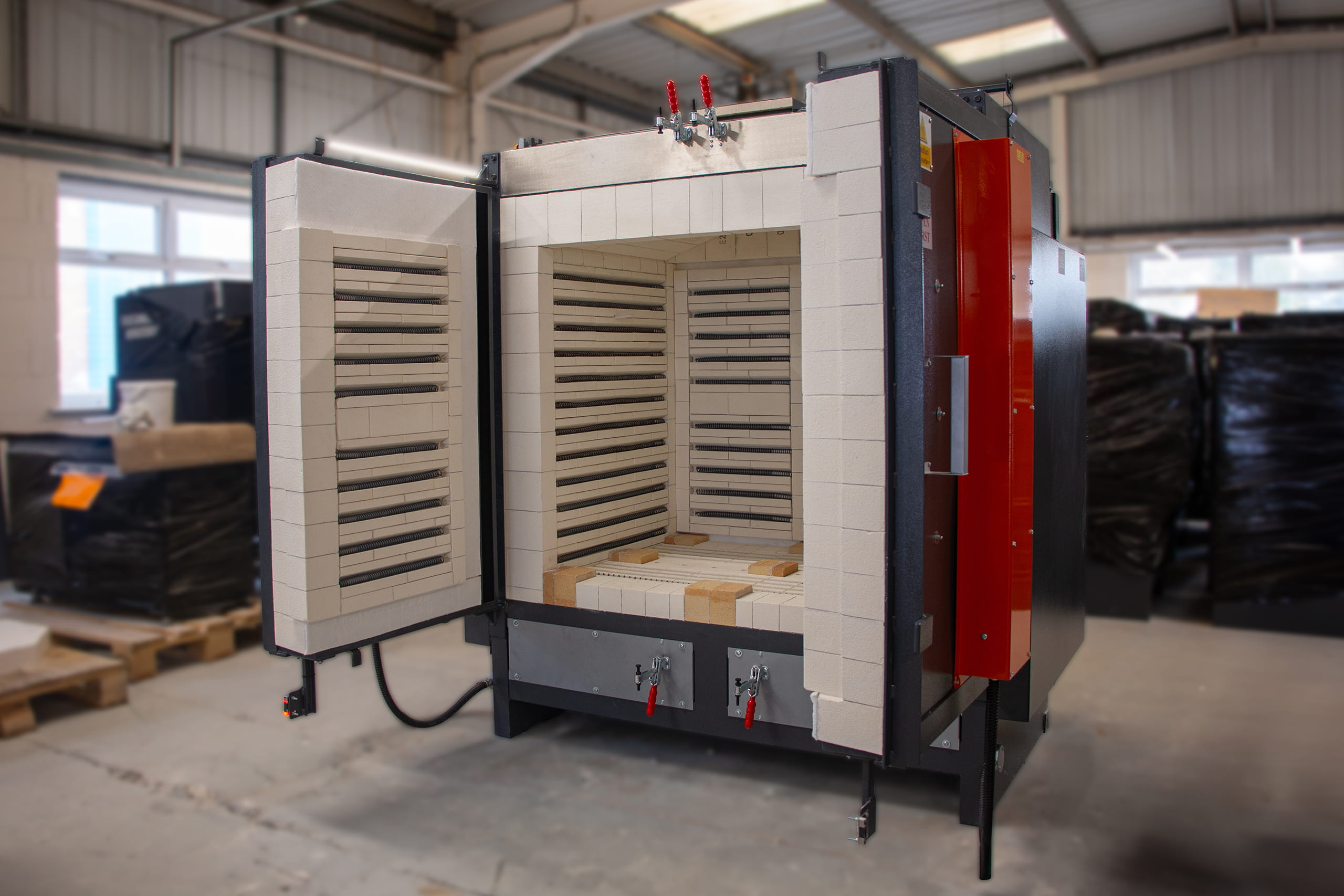 Kilns & Furnaces Bespoke Industrial Furnaces with two Double Doors that open on the front and reverse of the kiln